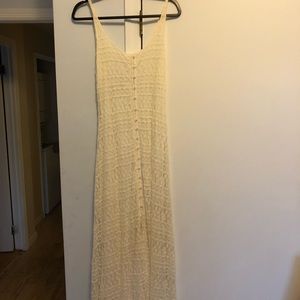 Long sleeveless lace dress
